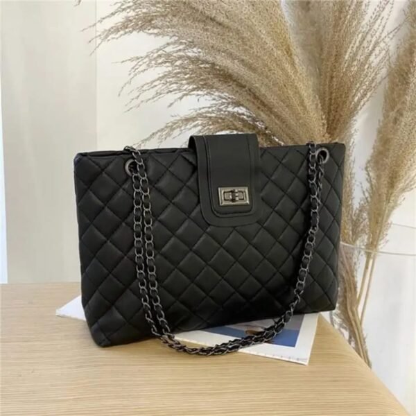 Black quilted flap handbag